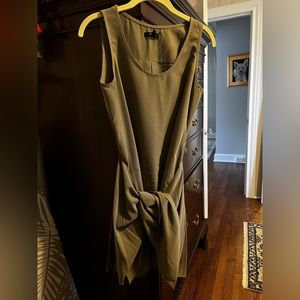 Dark green. It is so flattering on and it so cute with the tie in the front.